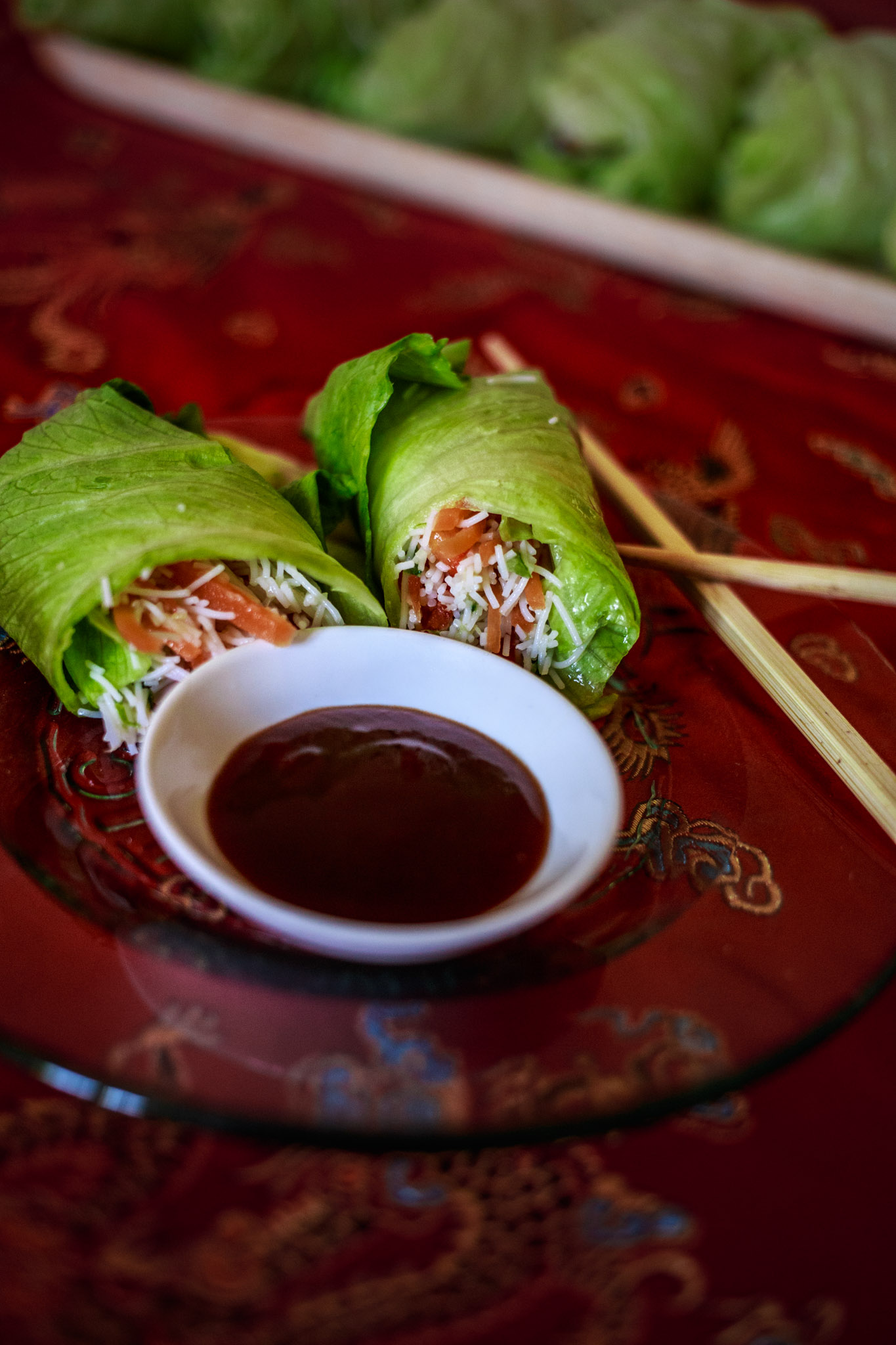 Food Photo of Lettuce Wraps stuffed with Rice Noodles and Vegetables with Hoisin Sauce
